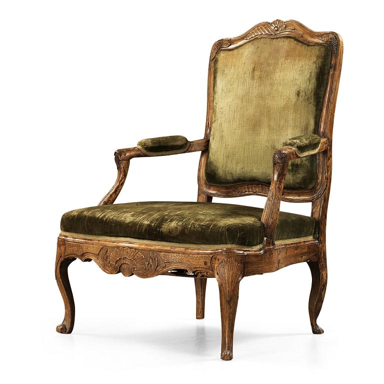 A Rococo 18th century armchair.