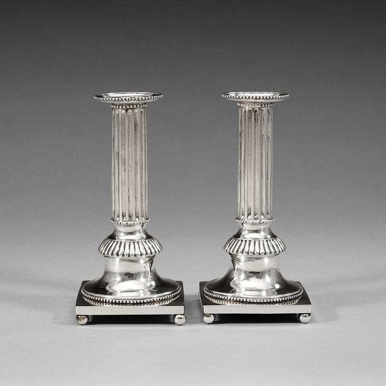 A pair of Swedish early 19th century silver canlesticks, Carl Magnus Ryberg, Stockholm 1807.