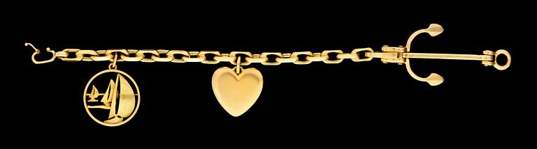 A gold charm bracelet.