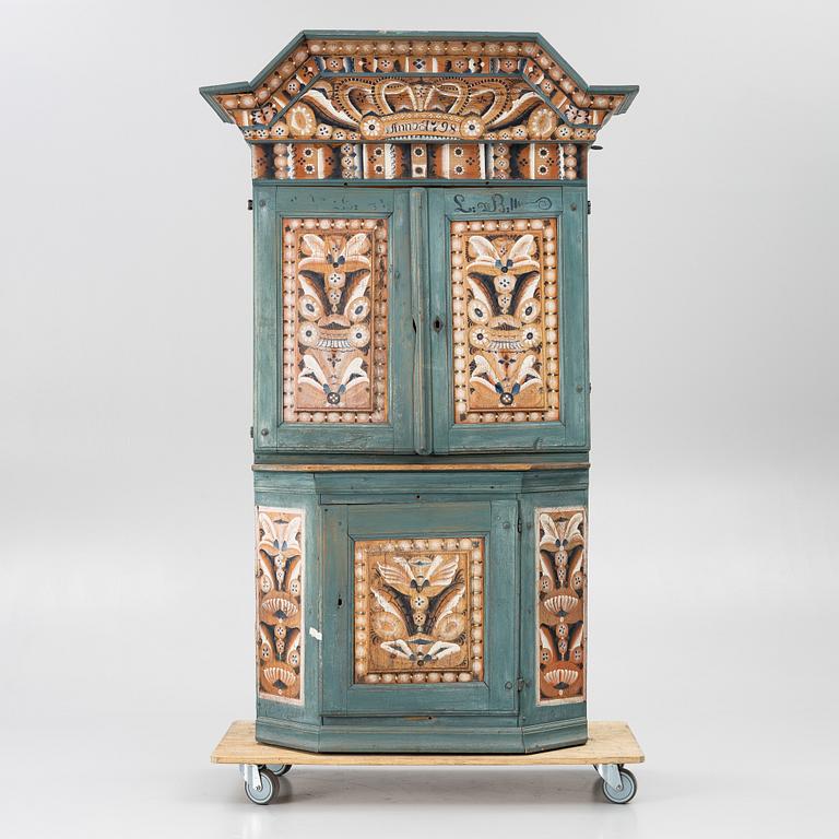 A Dalecarlian polychrome painted cabinet, dated 1798.