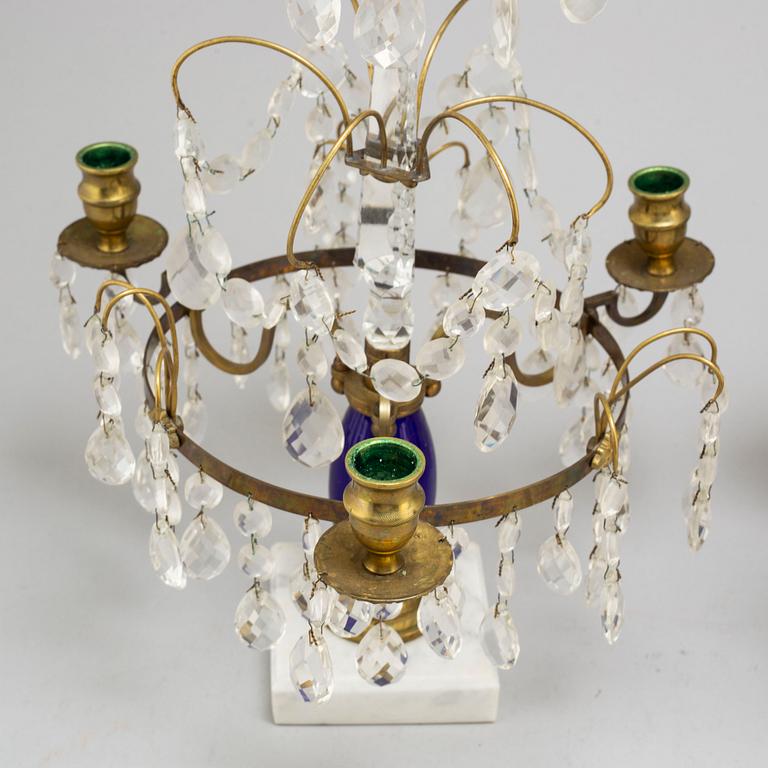 A pair of Gustavian style cut glass candlesticks, circa 1900.