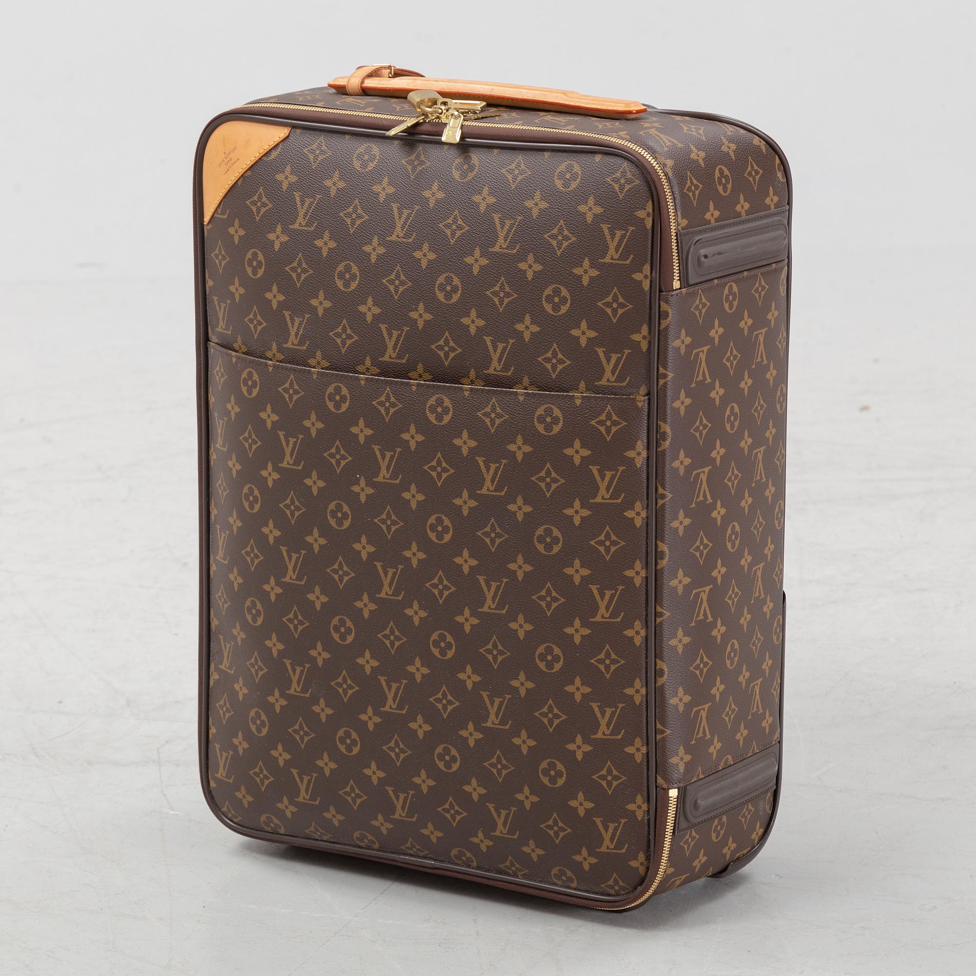 Louis Vuitton, a monogram canvas 'Pegase 55' suitcase, 2009.