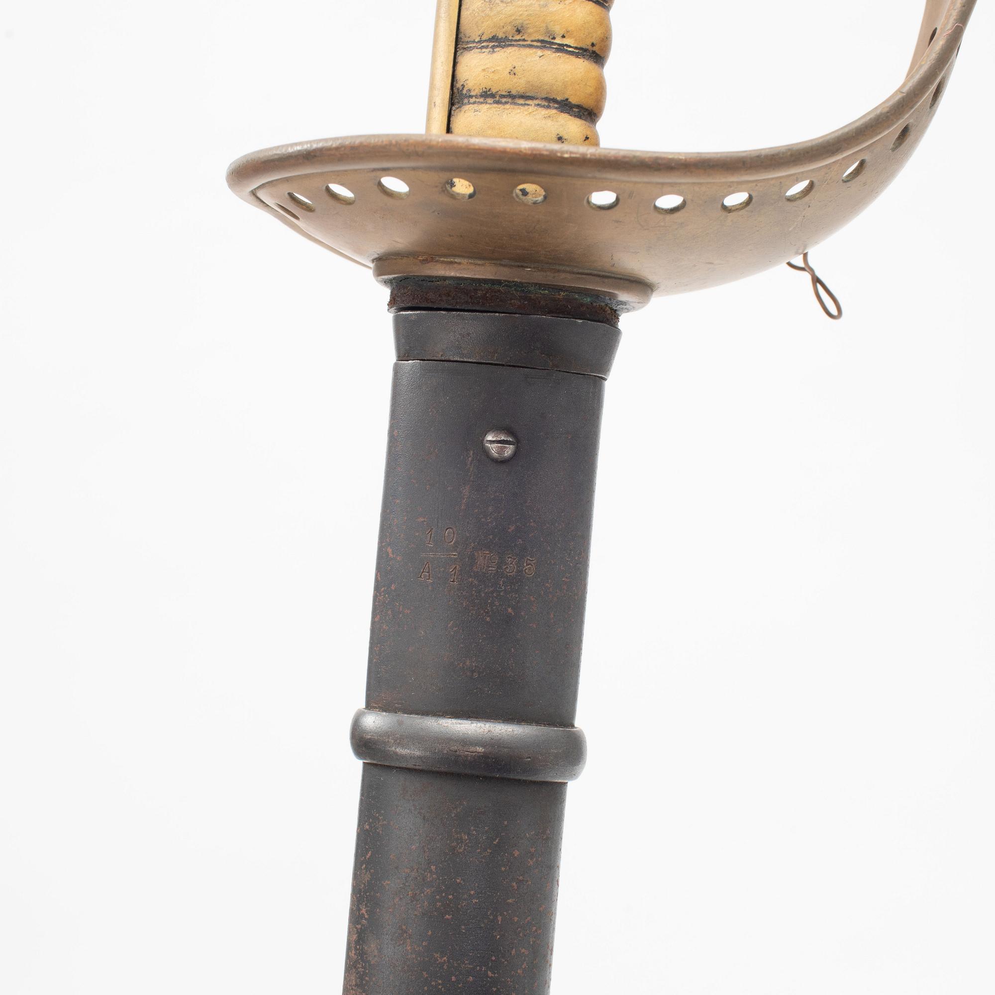 A Swedish cavalry saber with scabbard, 1893 pattern.