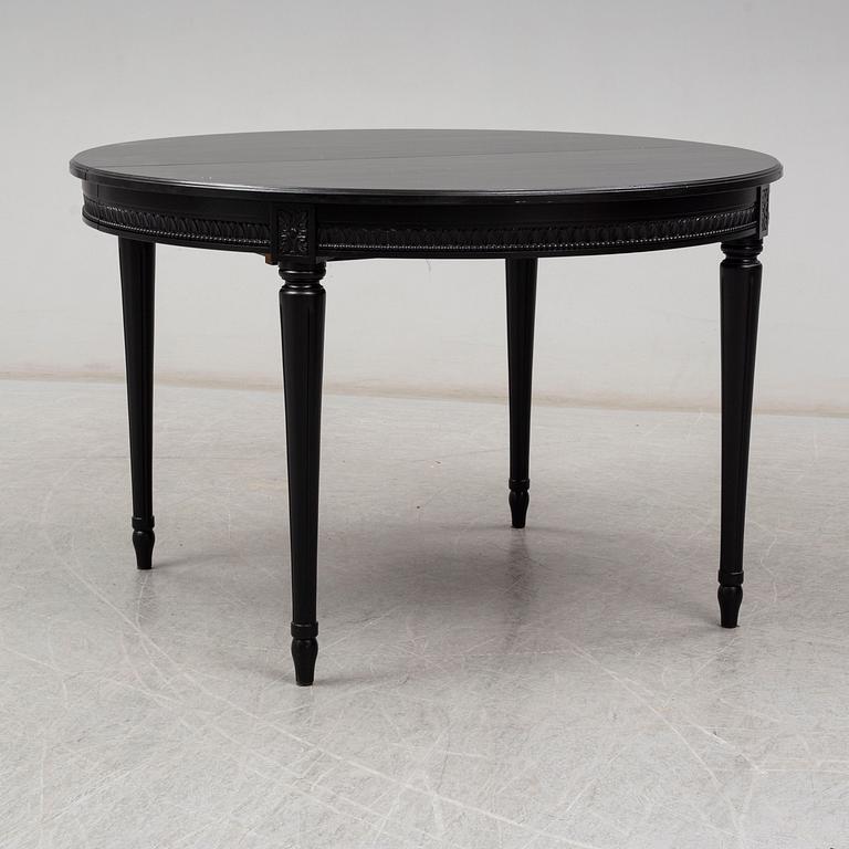 A late 20th Century painted table.