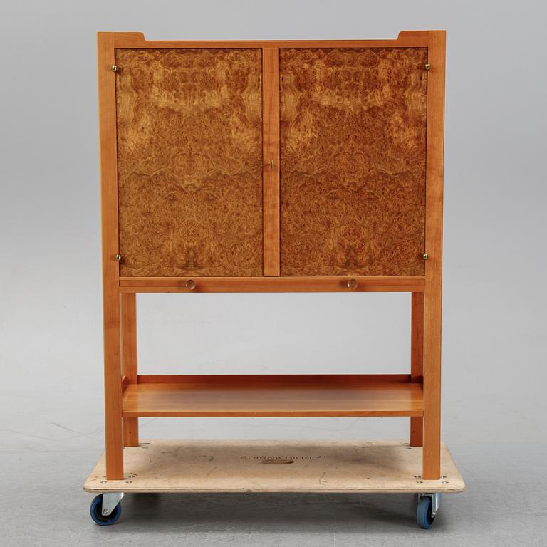 A model 2135 cabinet by Josef Frank for Firma Svenskt Tenn.