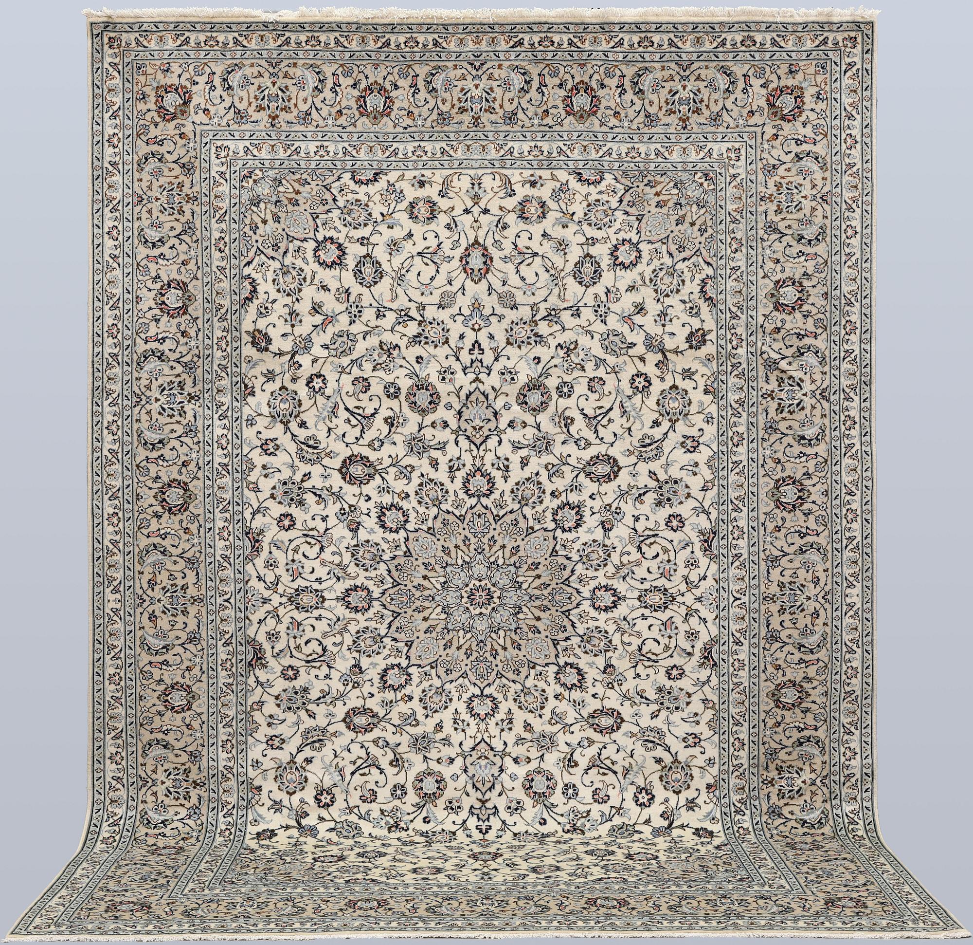 A Keshan carpet, approx. 355 x 250 cm.