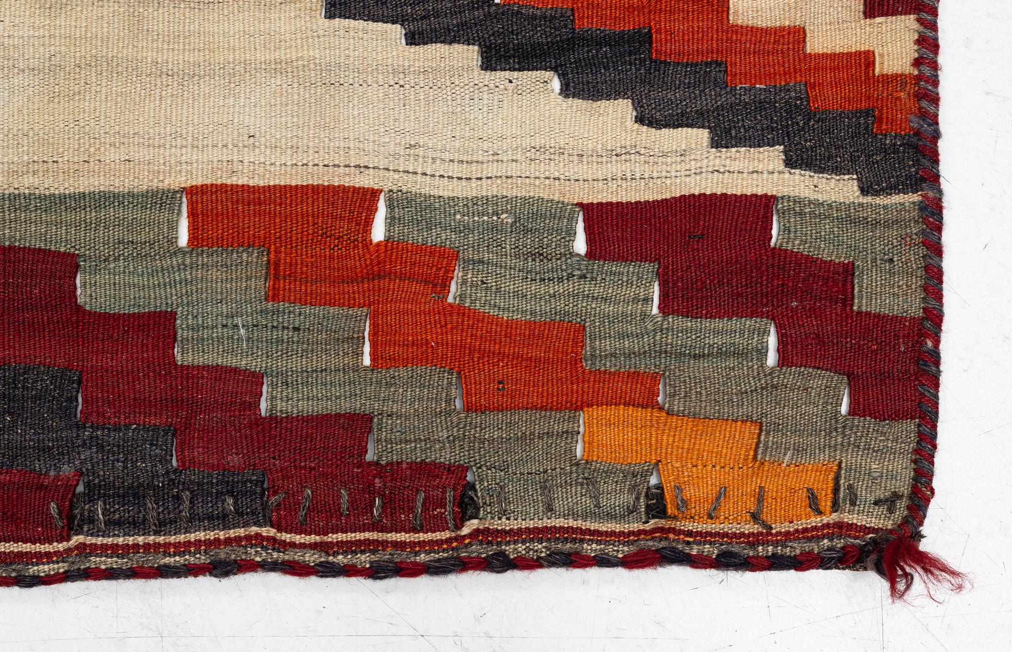 A semi-antique Qashqai kilim, c. 350 x 188 cm.
