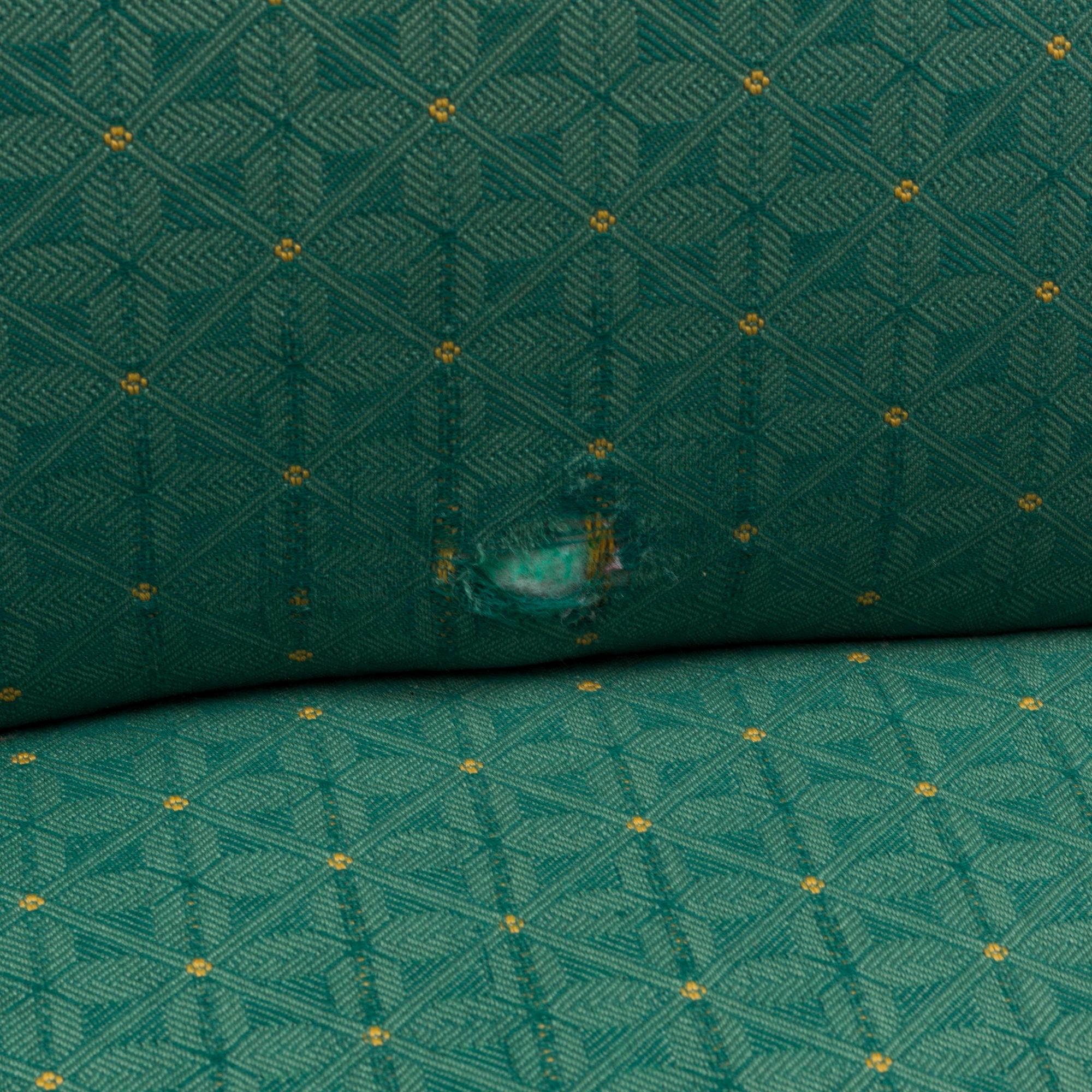 A 1960s Alf Svensson "Contour" armchair and stool.