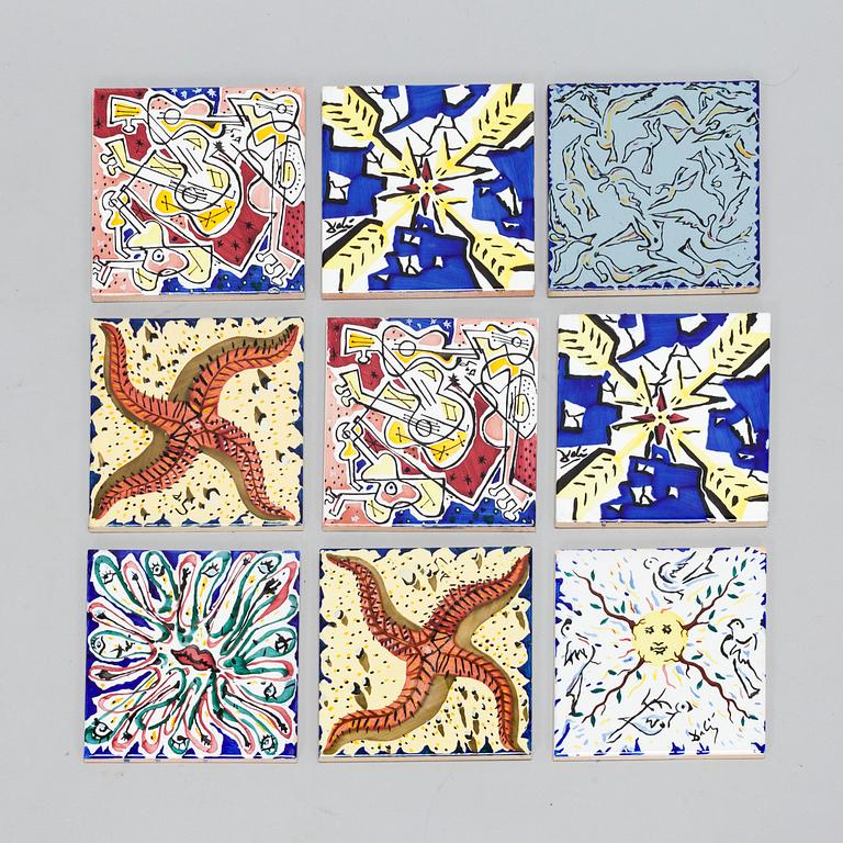 A set of nine earthenware tile plates, after Salvador Dalí, late 20th century.