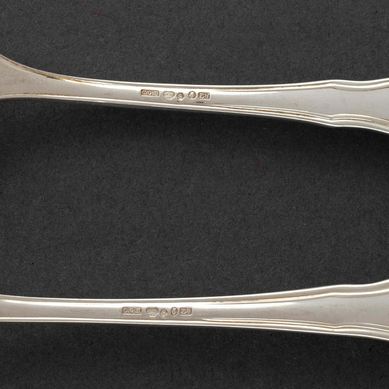 CG HALLBERG, 12 pieces of silver fish cutlery from Stockholm, 1930-1.