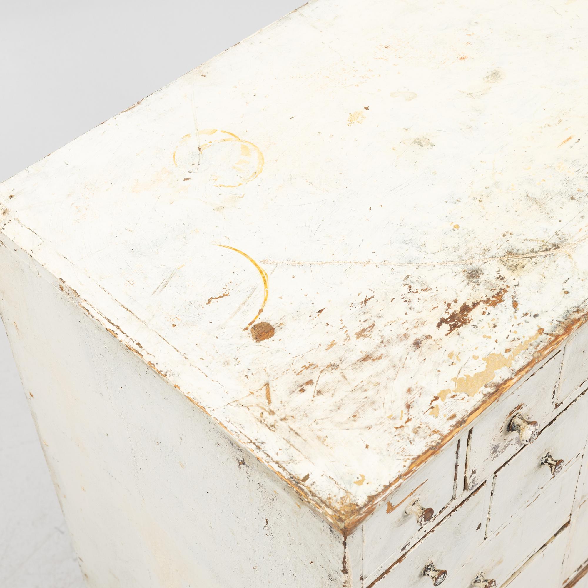 A painted chest of drawers, 20th Century.