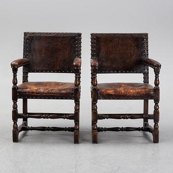 A pair of baroque style armchairs, first half of the 20th century.