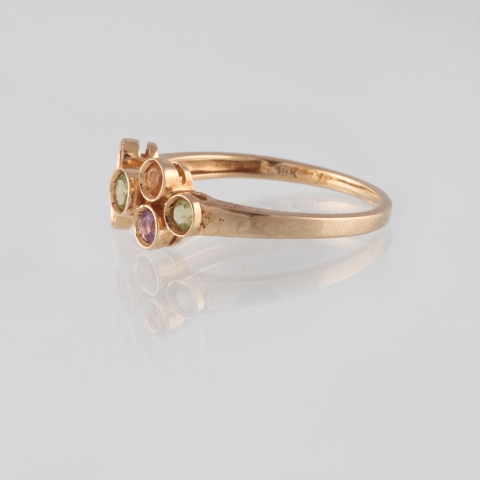 RING, 18K guld med fasettslipade citriner, ametister och troligen peridoter, Iduna, Varberg. Vikt 2,4 gram.