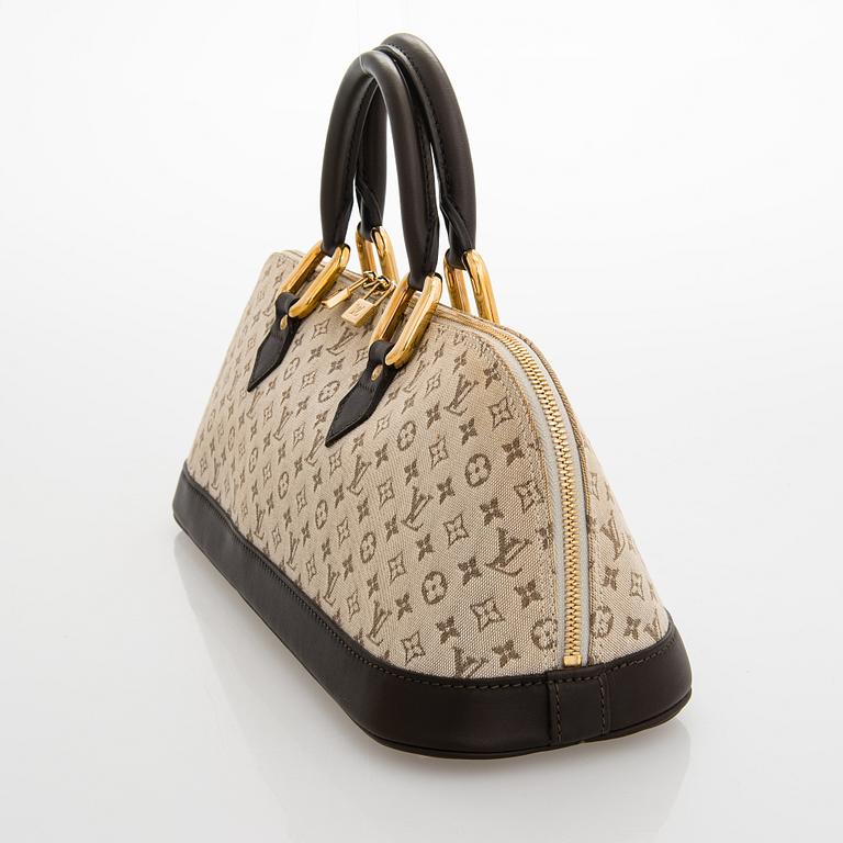 Louis Vuitton, a 'Monogram Mini Lin Alma Long Handbag'.