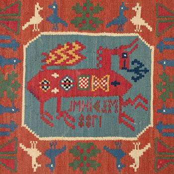 A double-interlocked tapestry carrige cushion, ca 108 x 51 cm, 'Bäckahästen', dated 1788.