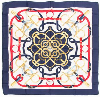 An 'Eperon d'Or' silk scarf.