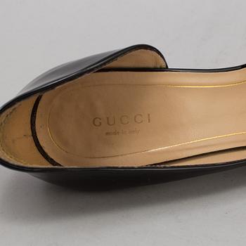 A pair of pumps by Gucci, in size 39.