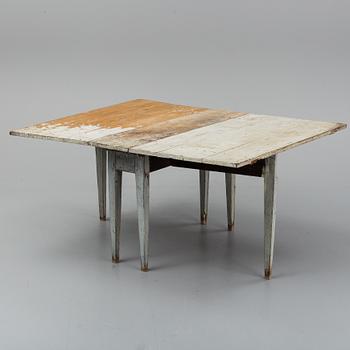 An early 19th century gate leg table.