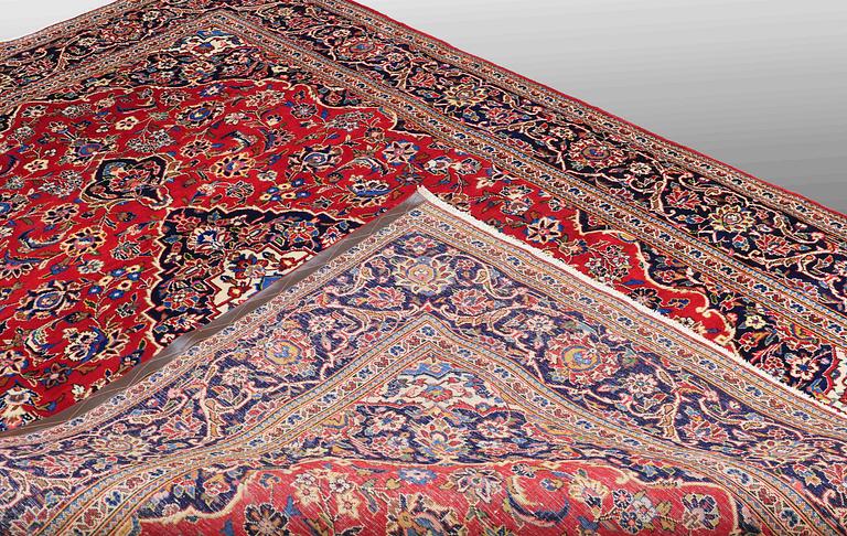 A CARPET, Kashan , signed, ca 300 x 202 cm.