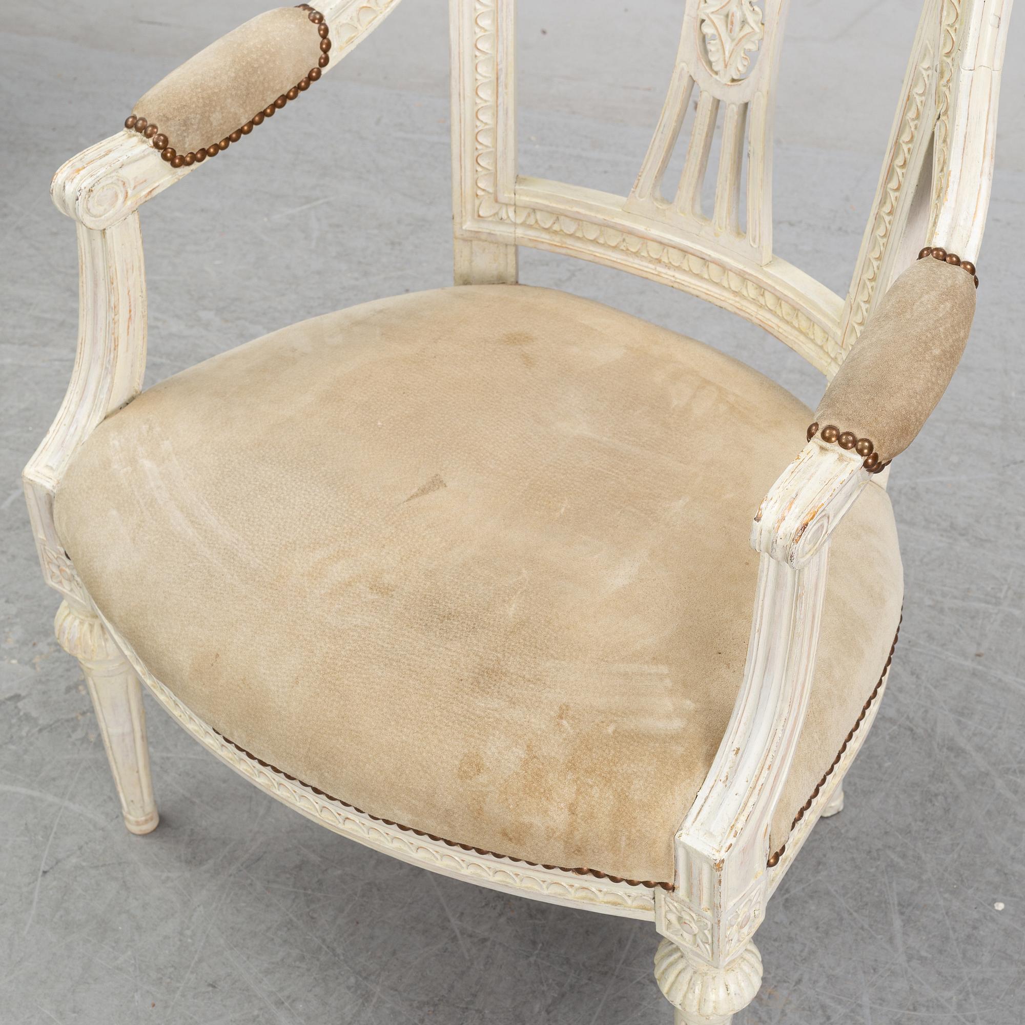 A set of two Gustavian arm chairs from the early 19th Century.