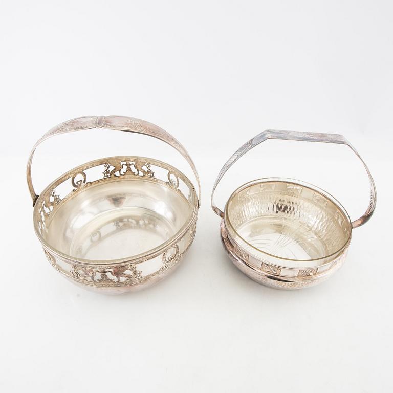 Two henkelskålar in silver-plated metal from the early 20th century, one marked Wurtembergische Metalwarenfabrik, Art Nouveau.
