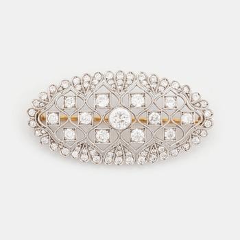 488. A platinum and gold brooch set with old-cut diamonds.