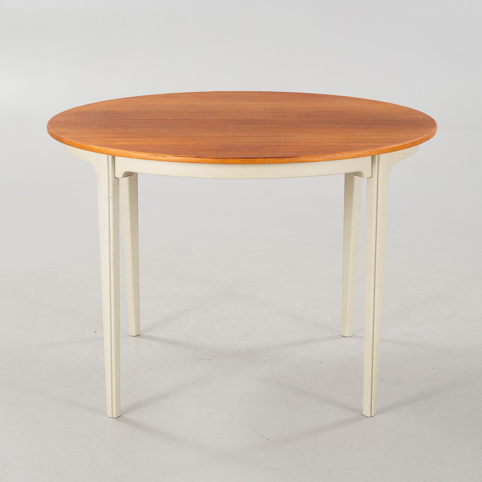 Four chairs and a dining table, probably Karl Andersson & Söner, second half of the 20th century.