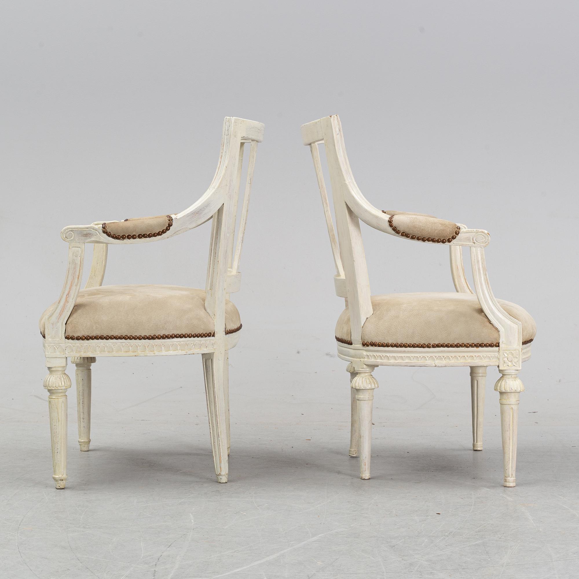 A set of two Gustavian arm chairs from the early 19th Century.