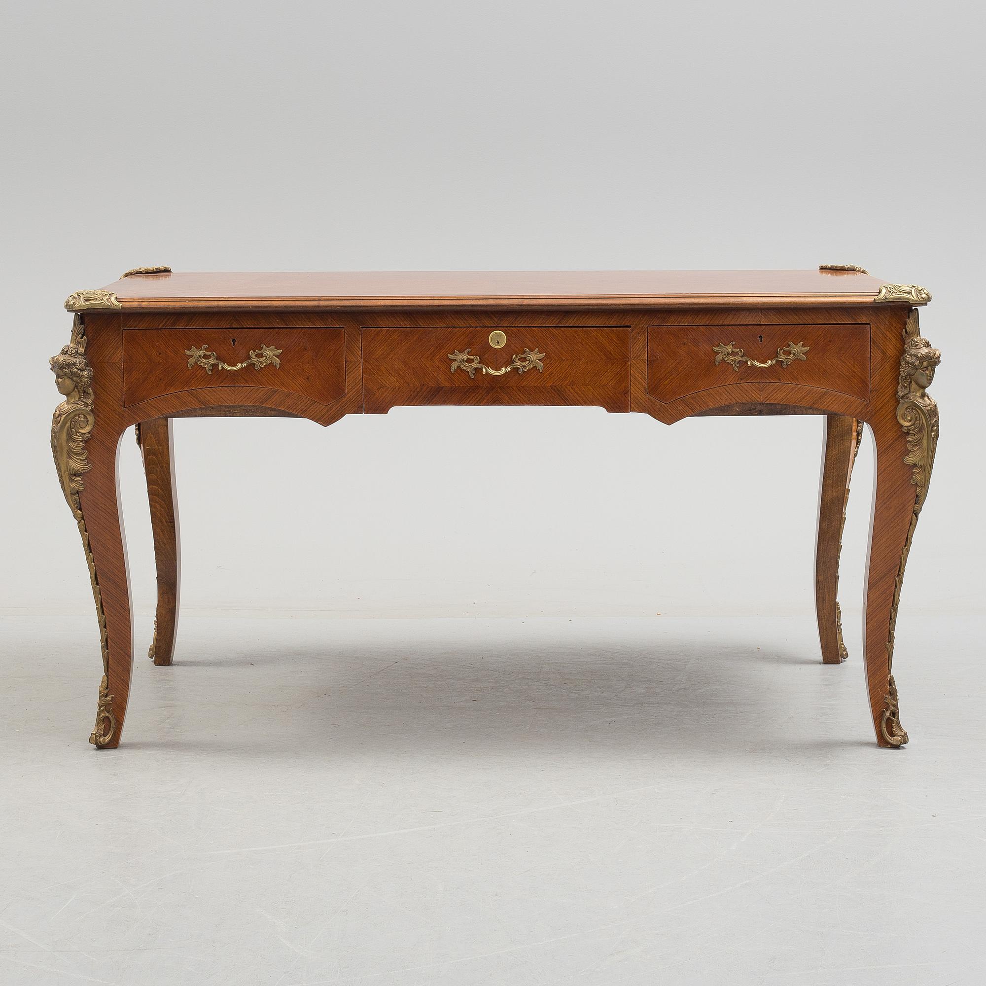 a rococo-style writing desk from the middle of the 20th century.