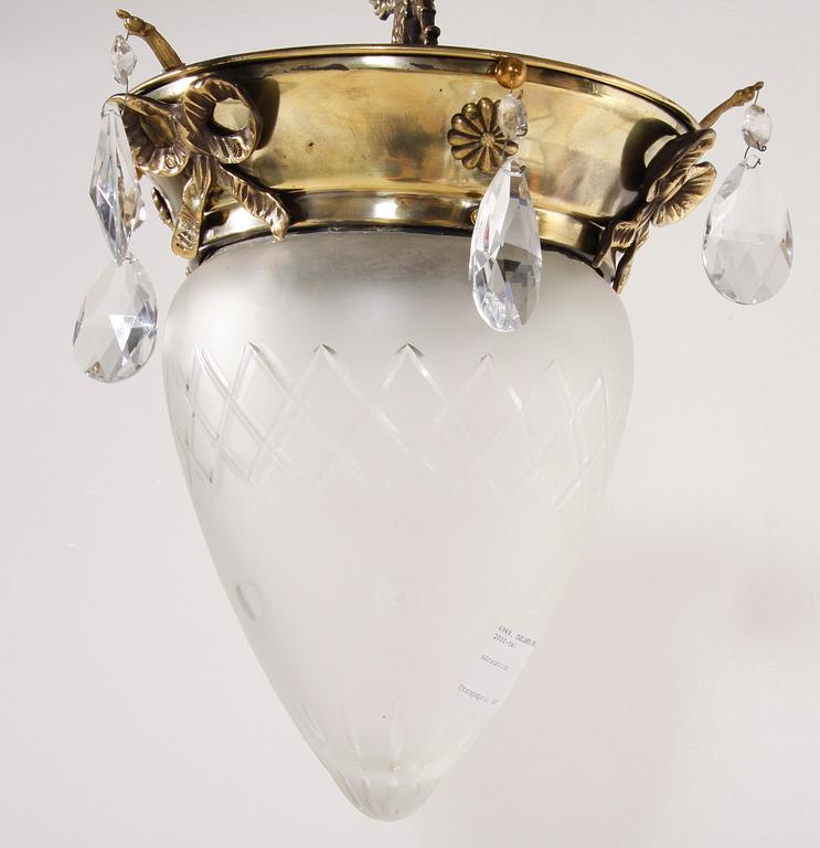 TAKLAMPA. Mässing samt glas, 2000-tal.