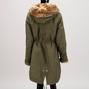 Ladies Woolrich Military Parka in size L.