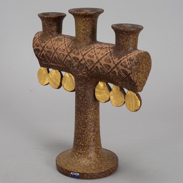LISA LARSON, a stoneware candelabra and a figurine. Gustavsberg.