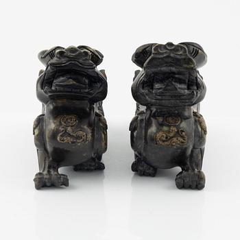 A pair of Chinese stone sculptures of mythical creatures, 20th Century.
