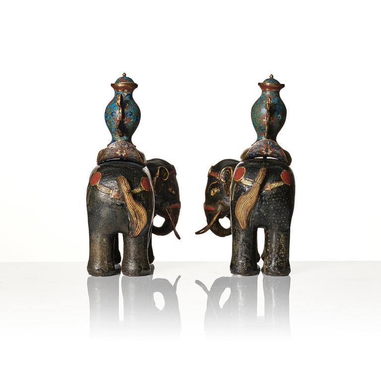 A pair of Chinese cloisonné and chamleve caparisoned elephants, Qing dynasty, 18th/19th Century.