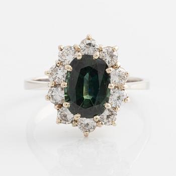 18K white gold with green sapphire and brilliant-cut diamond ring.