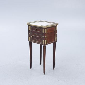 A Louis XVI-style chamberpot cupboard, late 19th century.