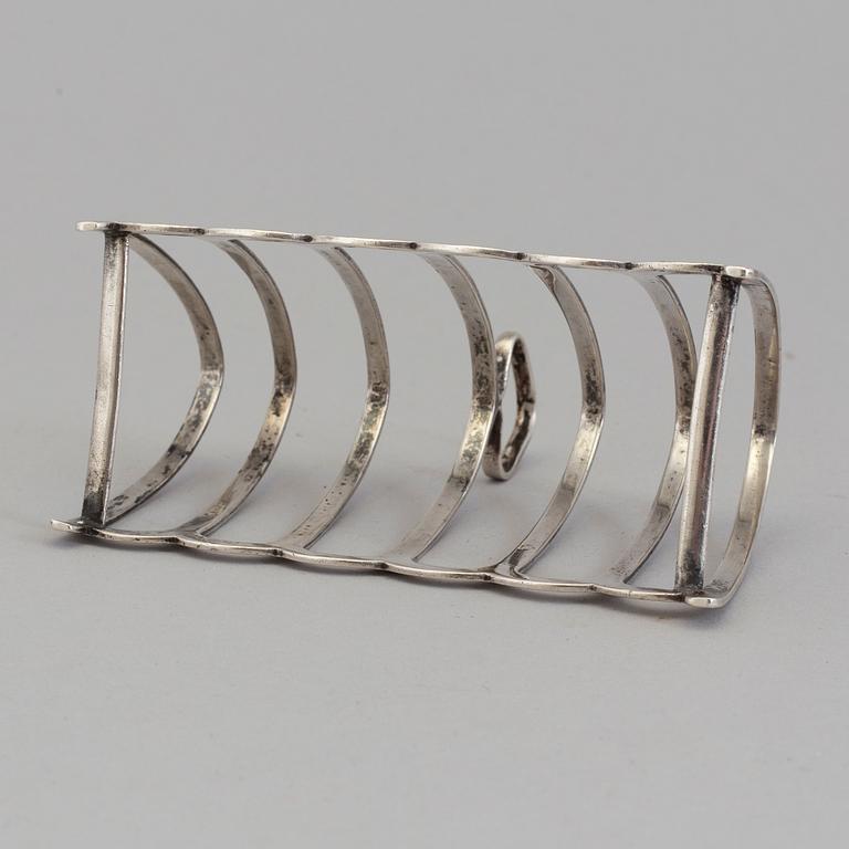 A 1934 silver toastrack by Baker&Sons, Birmingsham.