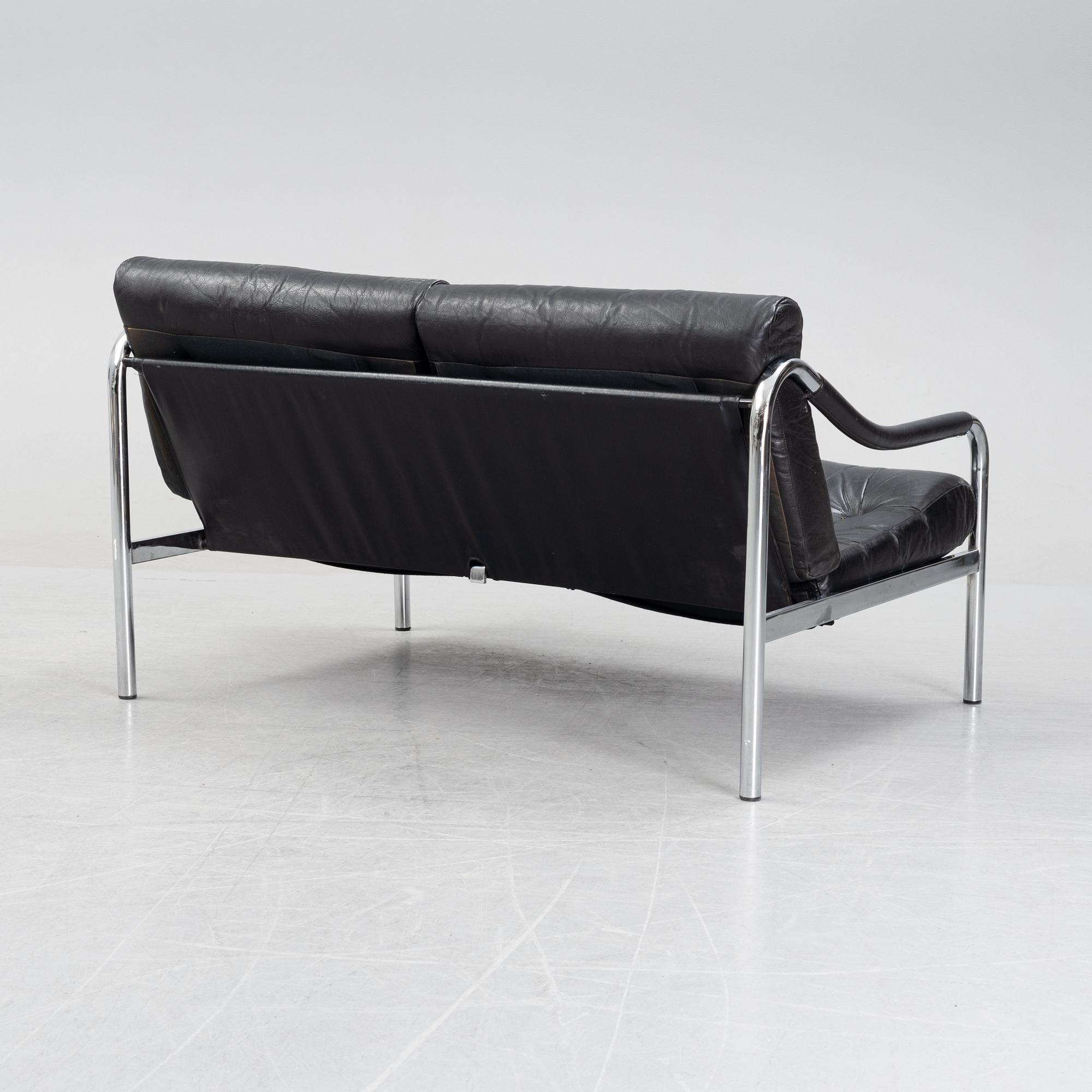 A 1960's leather upholstered 'Kadia' sofa  by Tim Bates for Pieff.