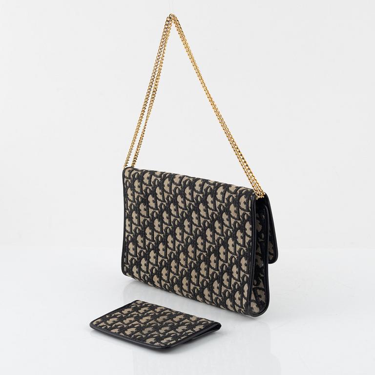 Christian Dior, handbag and wallet.