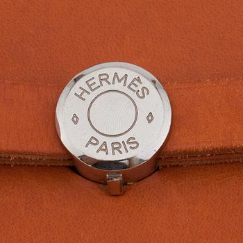 HERMÈS, a toil and vache fjord naturell "Herbag" handbag / backpack in two parts.