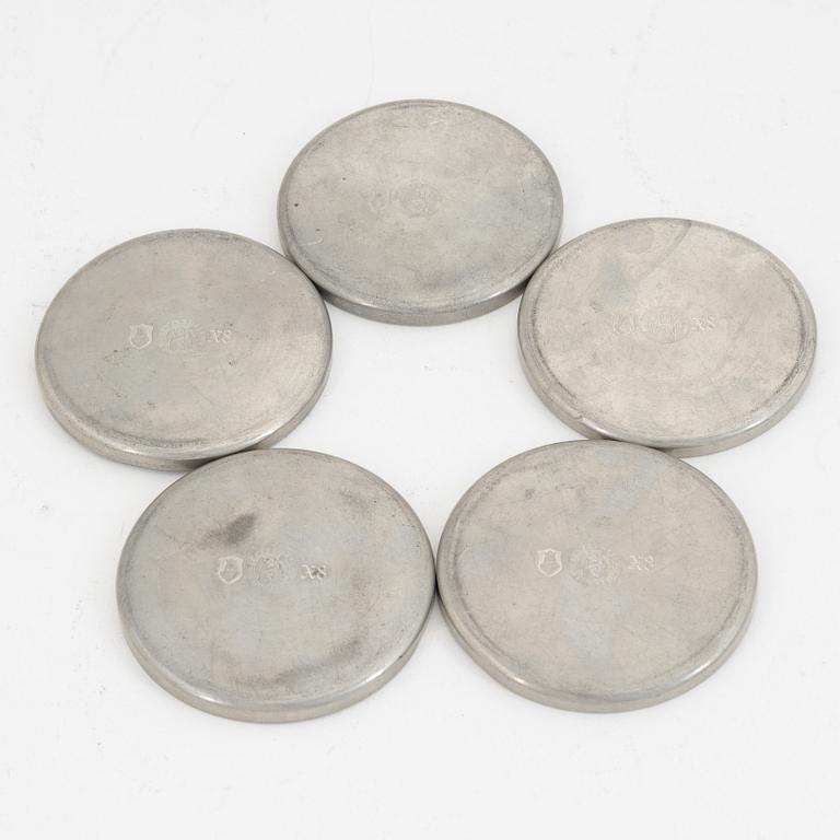 A group of 10 pewter coasters and 3 dishes, Firma Svenskt Tenn, 1948 and 1946.