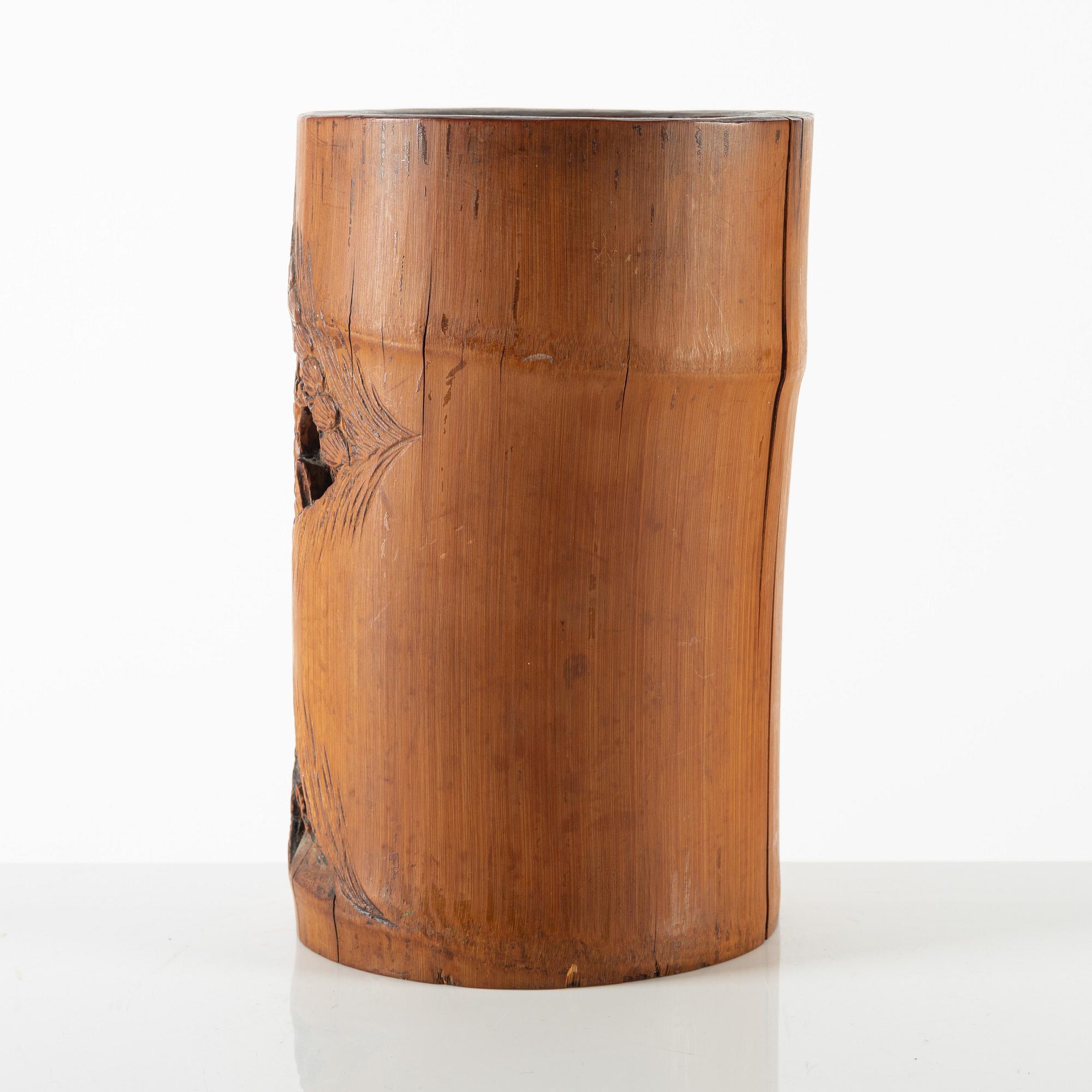 A Chinese carved bamboo brush pot, late Qing dynasty/around 1900.