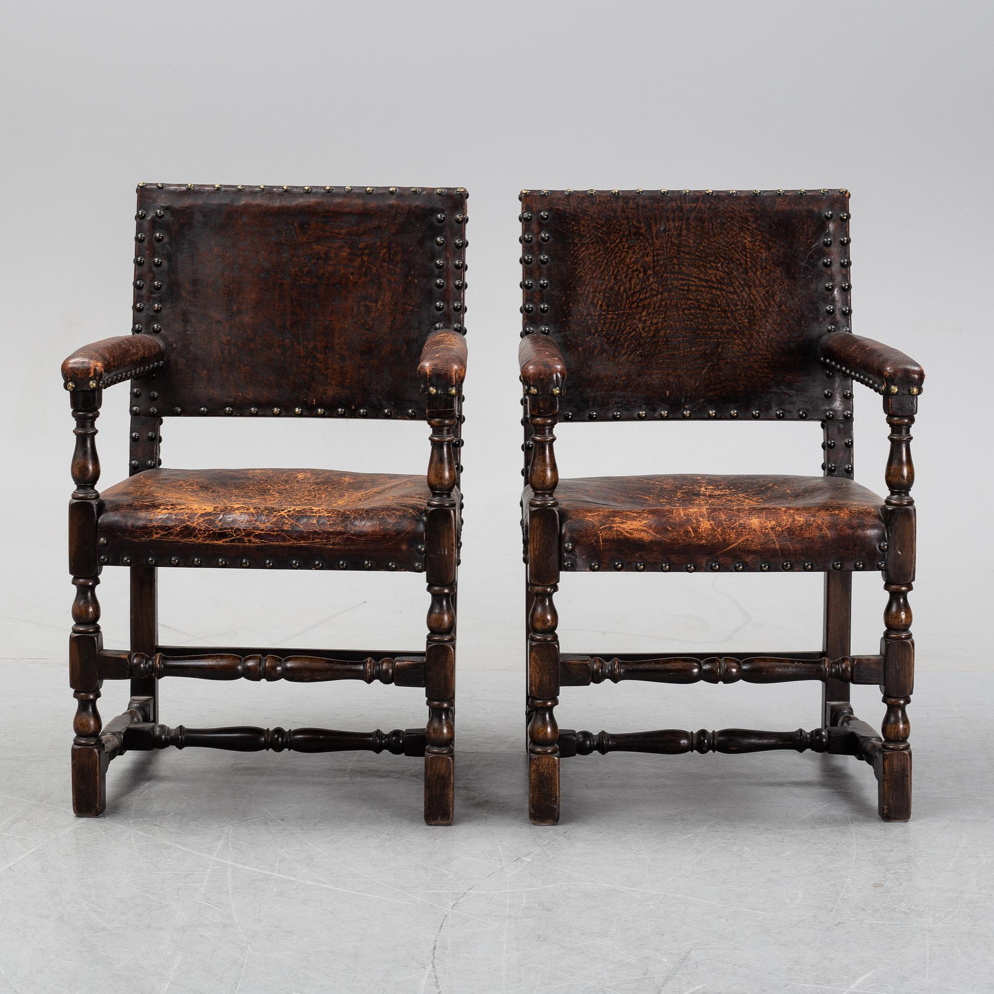 A pair of baroque style armchairs, first half of the 20th century.
