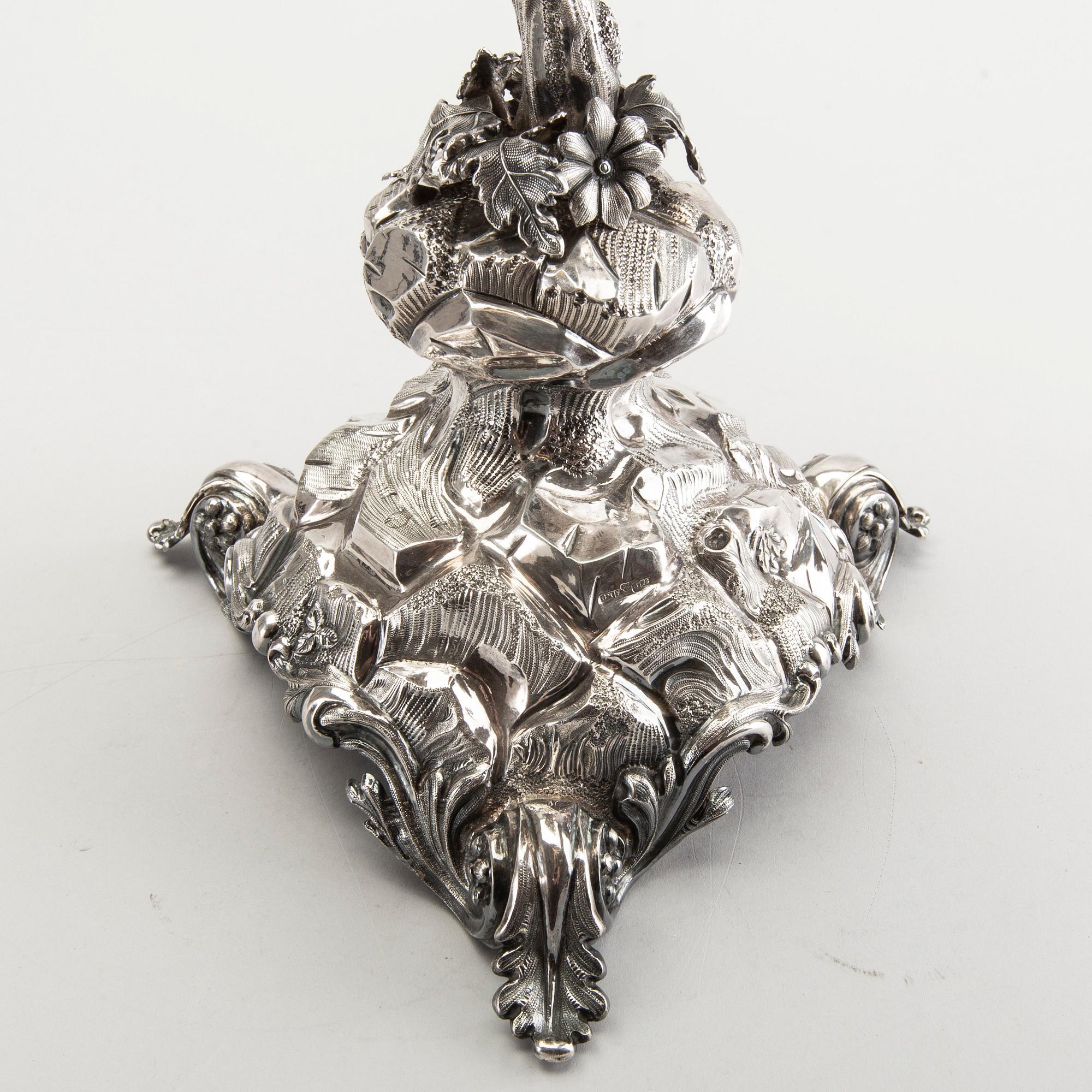 A silver wine cooler/vase by Gustaf Möllenborg, Stockholm 1869.