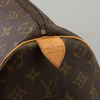 a LOUIS VUITTON "keepall 50" bag.