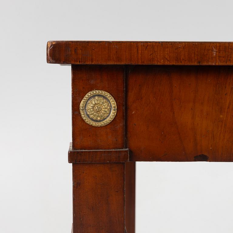 An empire console table, firts half of the 19th century.