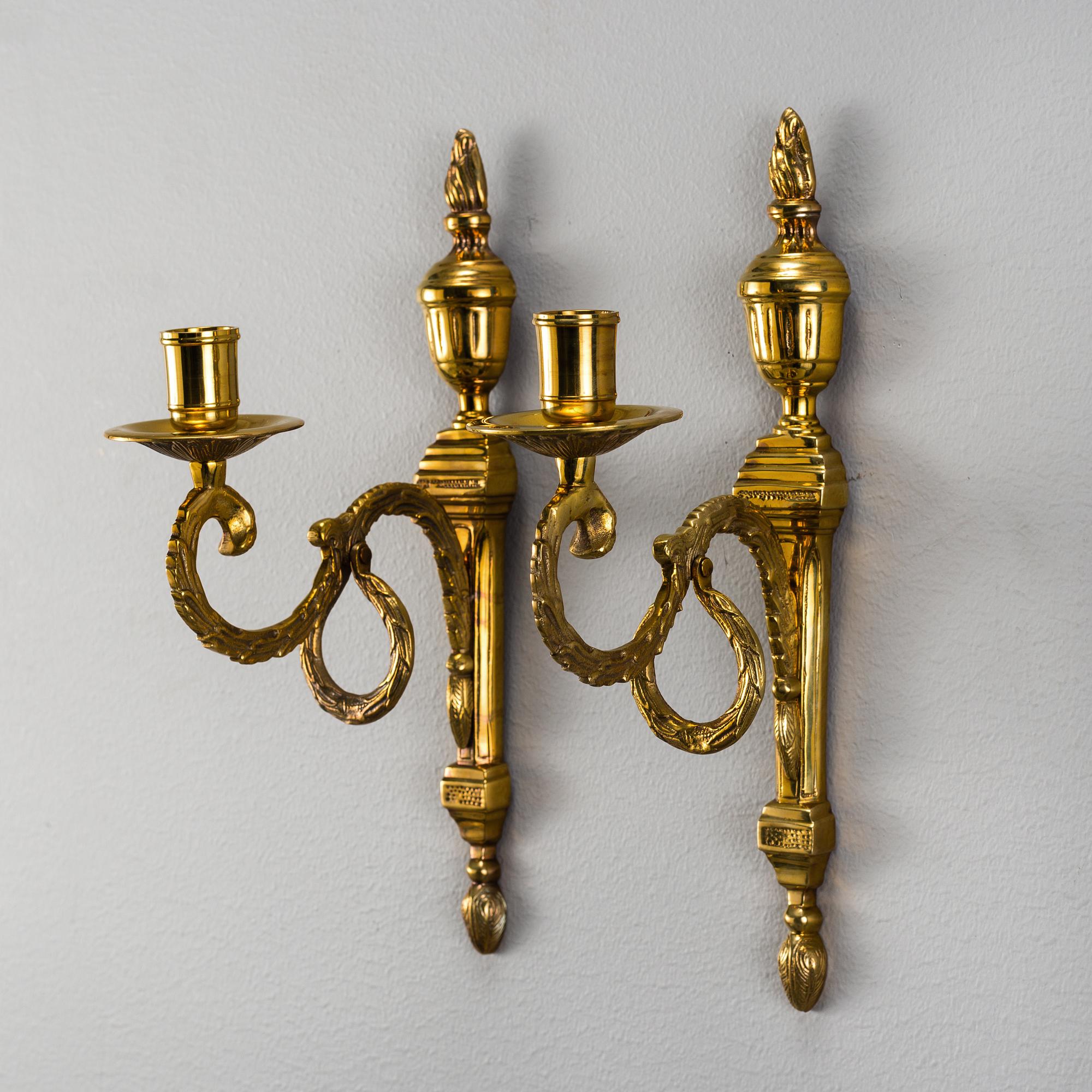 A pair of brass 'Törne' wall sconce, Ikeas 18th century Swedish Furniture series.