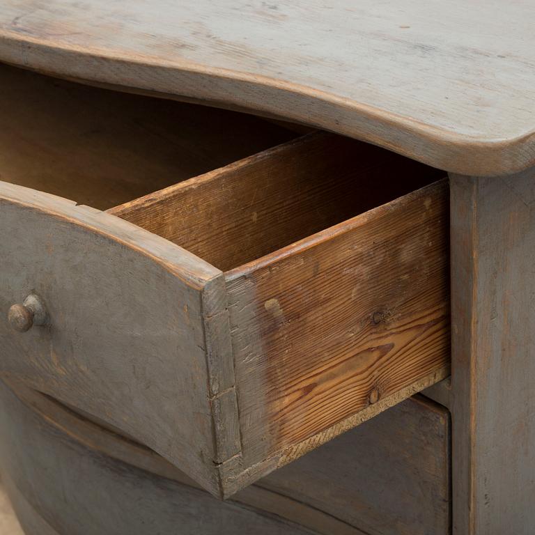 A 18th century rococo chest of drawers.