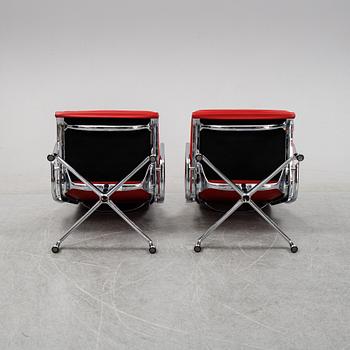 A pair of model EA 216 lounge chairs by Charles and Ray Eames for Vitra, designed 1969.