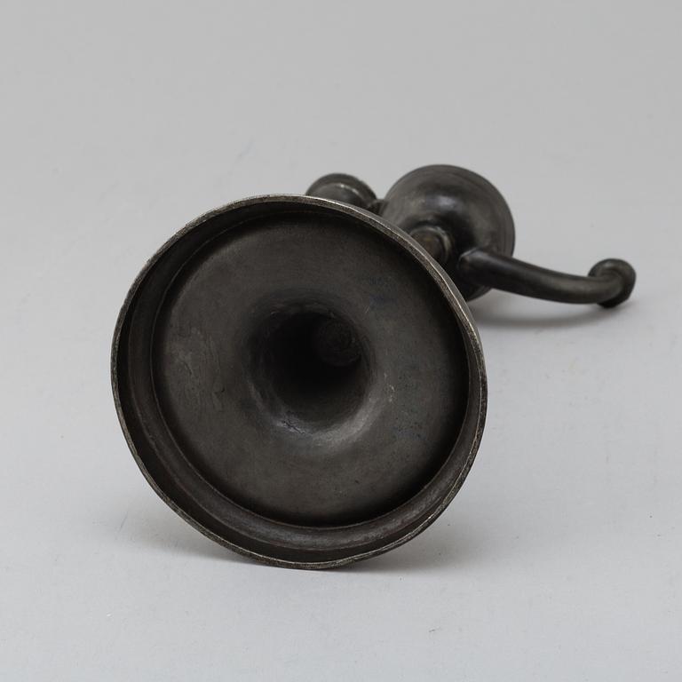 An 18th century pewter oil lamp.